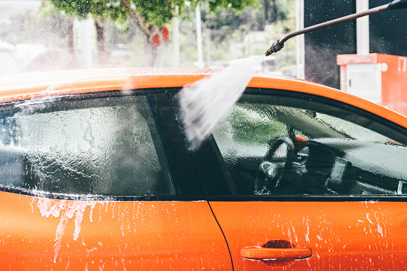 washing and orange car